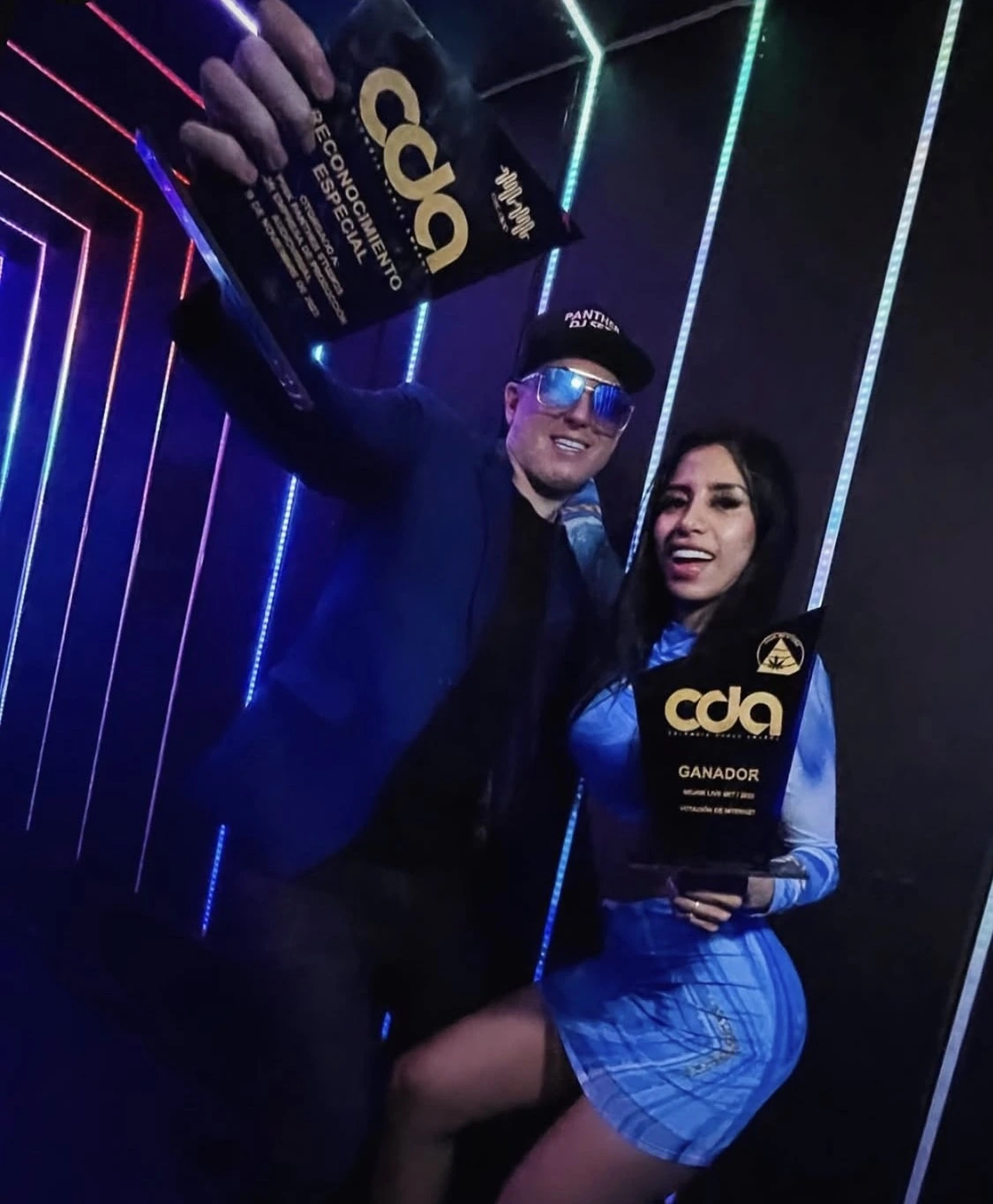 Panther at the Colombian Dance Awards with its two plaques